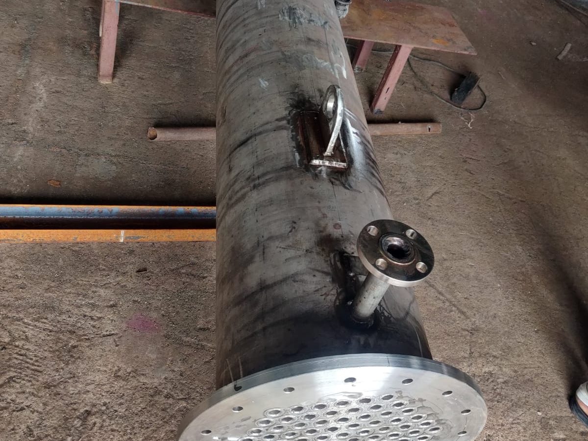 Completed SS 304 shell and tube heat exchanger with tubesheet and nozzles