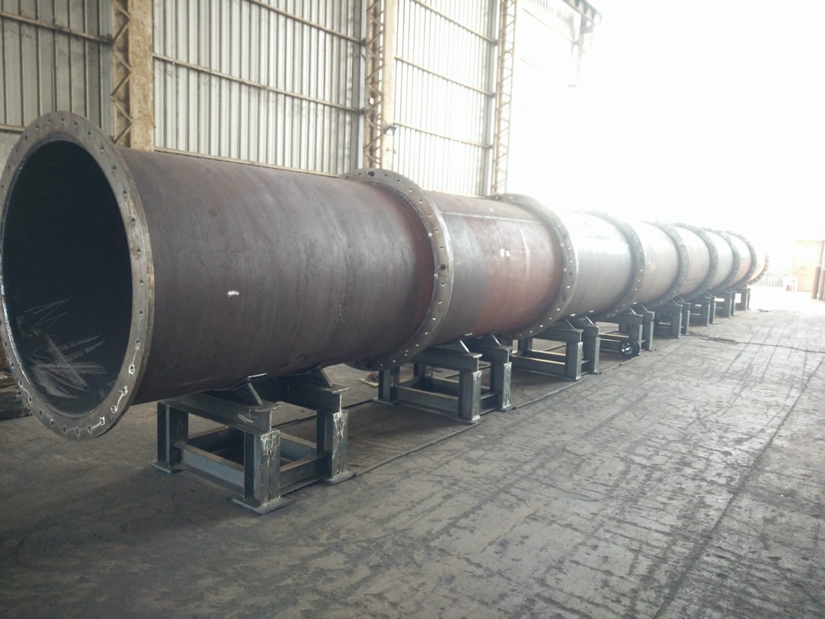 Row of flanged cylindrical process vessels in the SPCS fabrication bay